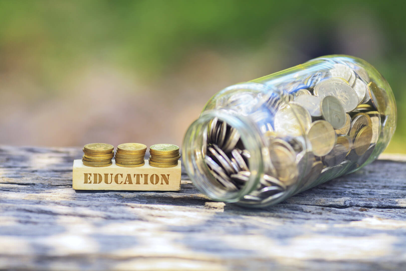 business,concept, ,education,word,golden,coin,stacked,with,wooden