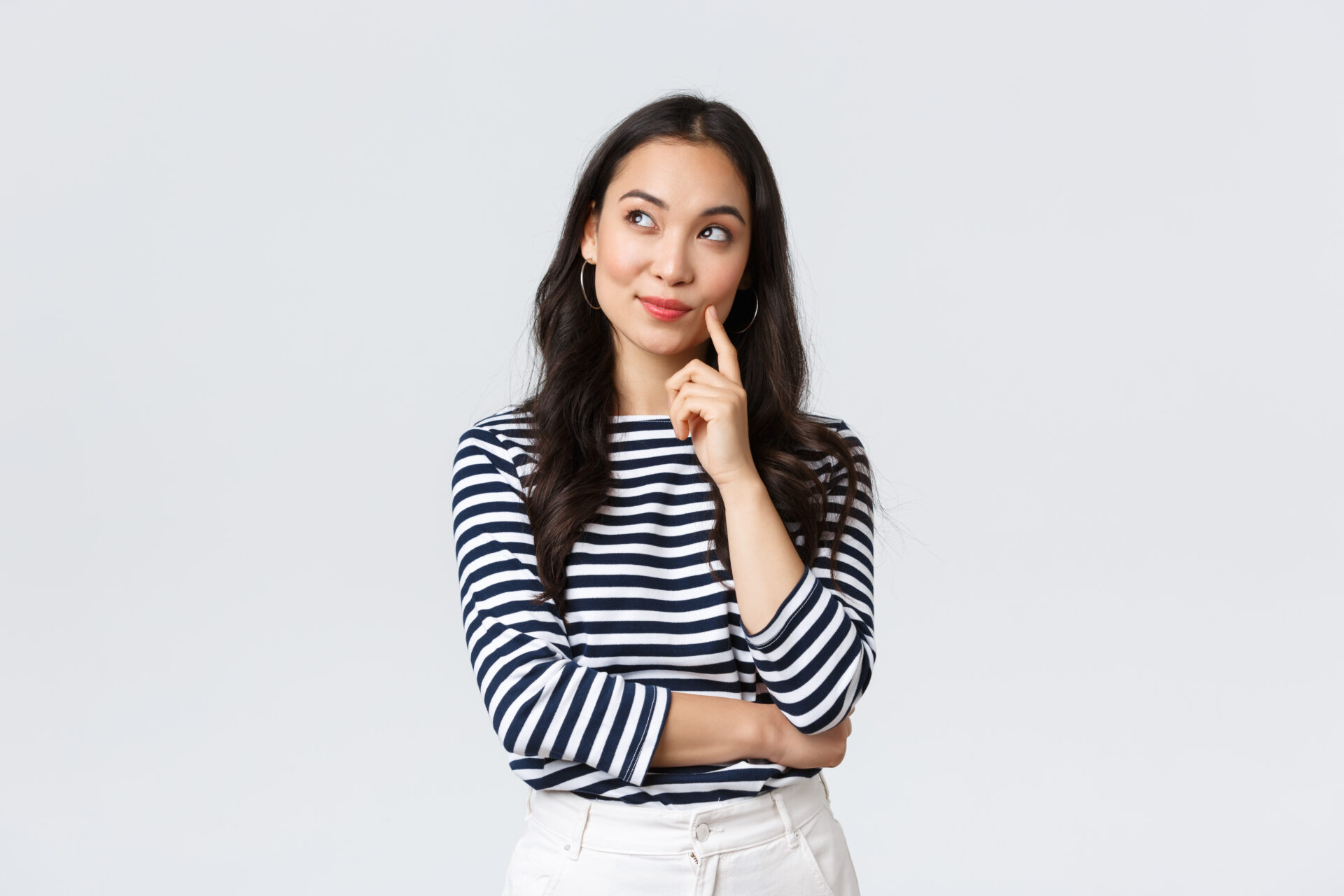 lifestyle people emotions casual concept thoughtful stylish young woman smiling pleased dreaming imaging perfect plan have interesting idea thinking looking upper left corner